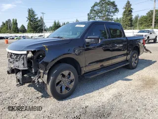 2023 Ford F-150 Lightning Pro with VIN 1FTVW1EV5PWG63666, listed as a Copart auction lot 60998415 with 35,089 mi miles and Salvage title. Bid and sale history available at DreamBid. Image 1.