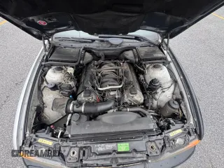 1999 BMW 5 Series 540i z VIN WBADN5333XGC91598, wystawiony jako Copart lot #61690655 z przebiegiem 174 320 mil mil oraz Szkoda całkowita • Salvage title. Historia ofert i sprzedaży dostępna na DreamBid. Obrazek 7.