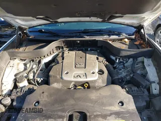2014 Infiniti QX70 with VIN JN8CS1MW2EM411237, listed as a IAAI auction lot 42011806 with 148,133 mi miles and . Bid and sale history available at carsss.com. Image 10.