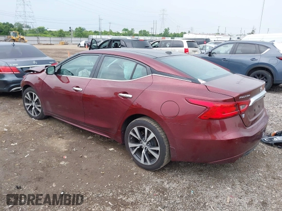 2016 Nissan Maxima SL with VIN 1N4AA6AP9GC401643, listed as a IAAI auction lot 42506704 with 103,197 mi miles and . Bid and sale history available at DreamBid. Image 3.