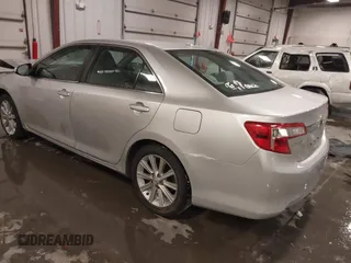 2014 Toyota Camry L with VIN 4T4BF1FK4ER412428, listed as a IAAI auction lot 41573095 with 130,000 mi miles. Bid and sale history available at carsss.com. Image 3.