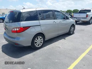 2012 Mazda 5 Sport with VIN JM1CW2BL8C0129591, listed as a IAAI auction lot 42513037 with 177,206 mi miles and . Bid and sale history available at DreamBid. Image 4.