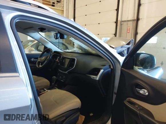 2015 Jeep Cherokee Latitude with VIN 1C4PJMCS5FW510298, listed as a IAAI auction lot 41518453 with 99,568 mi miles and . Bid and sale history available at DreamBid. Image 5.