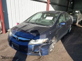 2009 Honda Civic Sdn LX with VIN 2HGFA16559H544472, listed as a IAAI auction lot 41695513 with 124,845 mi miles. Bid and sale history available at carsss.com. Image 6.