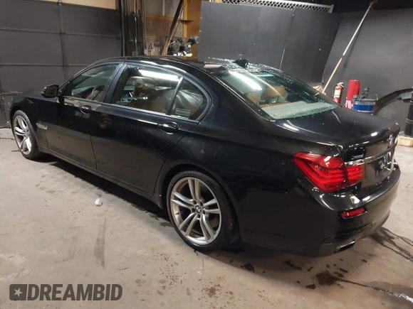 2014 BMW 7 Series ALPINA B7 xDrive with VIN WBAYF8C53ED141858, listed as a IAAI auction lot 40987098 with 128,404 mi miles and . Bid and sale history available at DreamBid. Image 3.