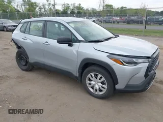 2023 Toyota Corolla Cross L with VIN 7MUAAABG4PV063424, listed as a IAAI auction lot 42119578 with 14,743 mi miles and . Bid and sale history available at DreamBid. Image 1.