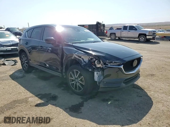 2018 Mazda CX-5 Grand Touring with VIN JM3KFADM9J1336792, listed as a Copart auction lot 52209435 with 107,852 mi miles and Salvage Title. Bid and sale history available at DreamBid. Image 14.