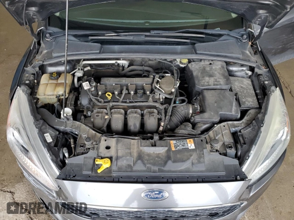 2016 Ford Focus SE z VIN 1FADP3F22GL298136, wystawiony jako Copart lot #58539185 z przebiegiem 101 580 mil mil oraz Szkoda całkowita • Salvage title. Historia ofert i sprzedaży dostępna na DreamBid. Obrazek 11.