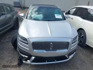 2019 Lincoln Nautilus Reserve with VIN 2LMPJ8LP6KBL15003, listed as a IAAI auction lot 41387415 with 63,618 mi miles. Bid and sale history available at carsss.com. Image 12.