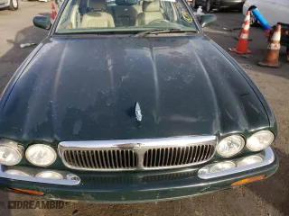 1999 Jaguar XJ with VIN SAJHD1048XC867723, listed as a Copart auction lot 76745444 with 170,999 mi miles and Salvage Title. Bid and sale history available at carsss.com. Image 13.