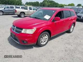 2013 Dodge Journey SXT with VIN 3C4PDDBGXDT641427, listed as a IAAI auction lot 42604902 with 149,256 mi miles and . Bid and sale history available at DreamBid. Image 2.