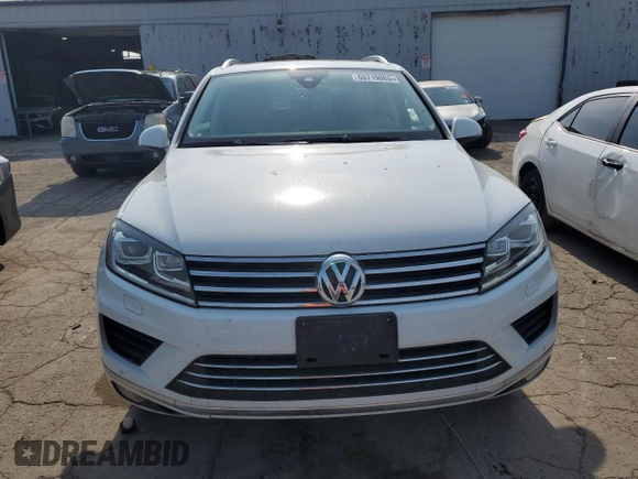 2016 Volkswagen Touareg Sport z VIN WVGEP9BPXGD005351, wystawiony jako Copart lot #60719065 z przebiegiem 133 674 mil mil oraz Czysty tytuł • Clean title. Historia ofert i sprzedaży dostępna na DreamBid. Obrazek 5.