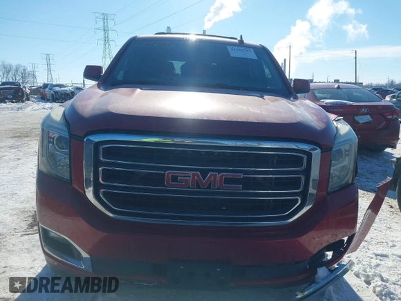 2015 GMC Yukon SLE with VIN 1GKS2AKC2FR514005, listed as a IAAI auction lot 41292783 with 129,413 mi miles. Bid and sale history available at carsss.com. Image 12.