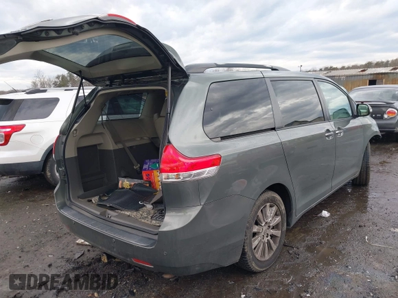 2013 Toyota Sienna XLE with VIN 5TDDK3DC7DS068591, listed as a IAAI auction lot 41483280 with 197,599 mi miles and . Bid and sale history available at DreamBid. Image 4.