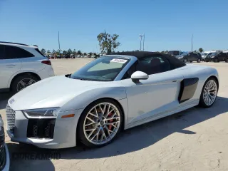2018 Audi R8 z VIN WUAVACFX1J7900121, wystawiony jako Copart lot #75092964 z przebiegiem Nie podano mil oraz Szkody całkowita. Historia ofert i sprzedaży dostępna na DreamBid. Obrazek 1.