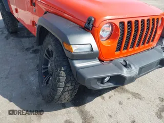 2020 Jeep Gladiator Sport S z VIN 1C6HJTAG0LL149161, wystawiony jako IAAI lot #42071132 z przebiegiem 153 062 mil mil oraz . Historia ofert i sprzedaży dostępna na DreamBid. Obrazek 18.