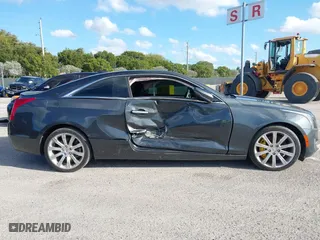 2016 Cadillac ATS Coupe Luxury Collection AWD with VIN 1G6AH1RX6G0109787, listed as a IAAI auction lot 41151839 with 71,573 mi miles. Bid and sale history available at carsss.com. Image 6.