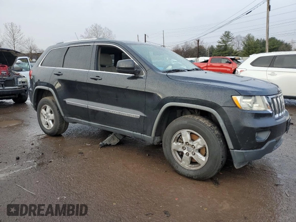 2011 Jeep Grand Cherokee Laredo with VIN 1J4RS4GG8BC508482, listed as a Copart auction lot 79261304 with 208,265 mi miles and Salvage Title. Bid and sale history available at DreamBid. Image 4.