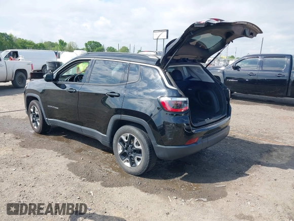 2021 Jeep Compass Altitude with VIN 3C4NJCBB0MT502423, listed as a IAAI auction lot 42006742 with 63,418 mi miles. Bid and sale history available at carsss.com. Image 3.
