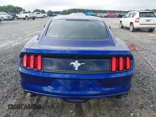 2015 Ford Mustang V6 z VIN 1FA6P8AM6F5411572, wystawiony jako IAAI lot #42377268 z przebiegiem 56 049 mil mil oraz . Historia ofert i sprzedaży dostępna na DreamBid. Obrazek 16.