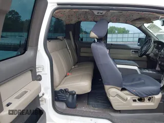 2010 Ford F-150 XL with VIN 1FTEX1CW9AKB68765, listed as a IAAI auction lot 42232399 with 207,909 mi miles and . Bid and sale history available at DreamBid. Image 8.