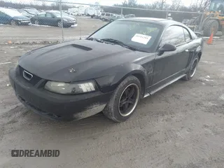 2003 Ford Mustang Standard with VIN 1FAFP40473F313103, listed as a IAAI auction lot 35721795 with 202,013 mi miles and . Bid and sale history available at DreamBid. Image 2.