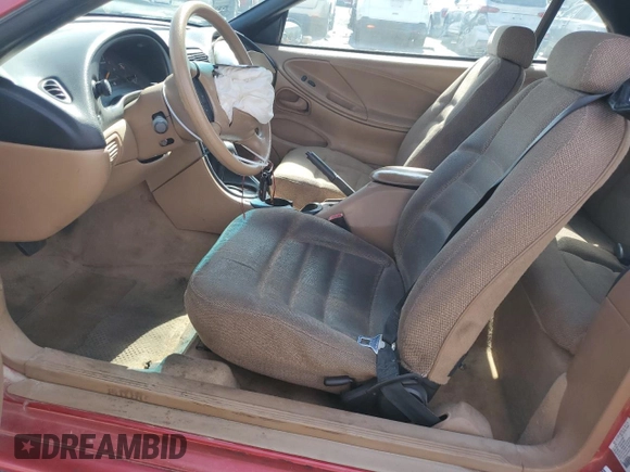 1998 Ford Mustang z VIN 1FAFP4440WF258072, wystawiony jako Copart lot #58944615 z przebiegiem 125 984 mil mil oraz Szkoda całkowita • Salvage title. Historia ofert i sprzedaży dostępna na DreamBid. Obrazek 7.