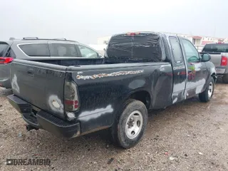 1997 Ford F-150 Standard with VIN 1FTDX1761VKC65051, listed as a IAAI auction lot 41450698 with 158,999 mi miles. Bid and sale history available at carsss.com. Image 4.