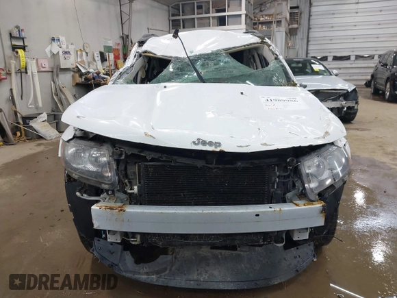 2014 Jeep Compass Sport with VIN 1C4NJDBB3ED773960, listed as a IAAI auction lot 41989986 with 126,875 mi miles. Bid and sale history available at carsss.com. Image 12.