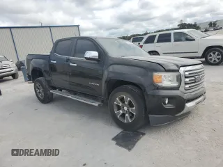 2015 GMC Canyon 2WD SLT with VIN 1GTG5CE31F1263234, listed as a Copart auction lot 76512794 with 113,180 mi miles and Salvage Title. Bid and sale history available at carsss.com. Image 4.