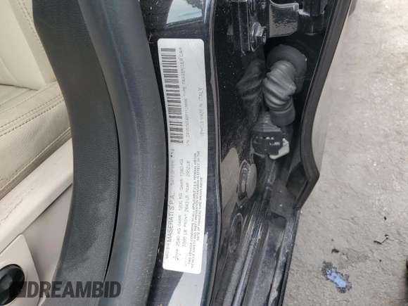 2015 Maserati Ghibli z VIN ZAM57XSA5F1129866, wystawiony jako Copart lot #51738015 z przebiegiem Nie podano mil oraz Szkoda całkowita • Salvage title. Historia ofert i sprzedaży dostępna na DreamBid. Obrazek 13.