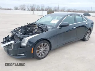 2017 Cadillac ATS AWD z VIN 1G6AG5RX6H0126052, wystawiony jako IAAI lot #41327350 z przebiegiem Nie podano mil oraz . Historia ofert i sprzedaży dostępna na DreamBid. Obrazek 16.