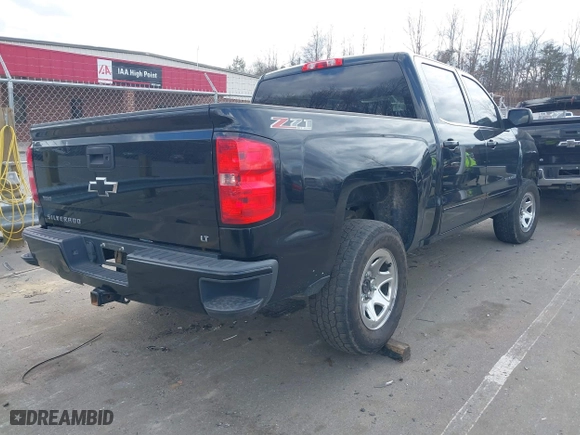 2016 Chevrolet Silverado 1500 LT with VIN 3GCUKREC3GG198548, listed as a IAAI auction lot 41718152 with 189,416 mi miles. Bid and sale history available at carsss.com. Image 4.