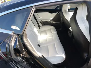2018 Tesla Model S 75D with VIN 5YJSA1E28JF273809, listed as a IAAI auction lot 42029434 with 85,972 mi miles and . Bid and sale history available at DreamBid. Image 8.