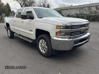 2015 Chevrolet Silverado 3500HD High Country with VIN 1GC4K1E86FF585320, listed as a Copart auction lot 45056365 with 184,776 mi miles and Salvage Title. Bid and sale history available at DreamBid. Image 1.