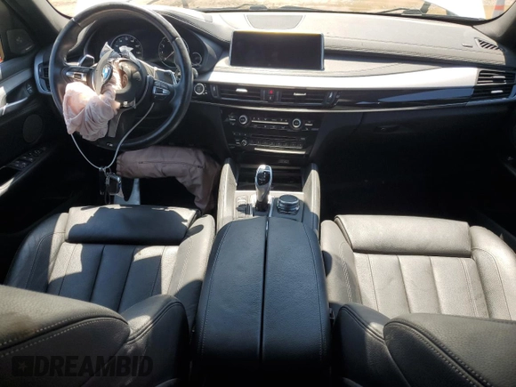 2019 BMW X6 xDrive50i with VIN 5UXKU6C56K0Z67074, listed as a Copart auction lot 65494064 with 97,702 mi miles and Salvage Title. Bid and sale history available at carsss.com. Image 8.