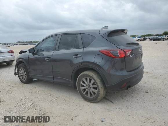 2016 Mazda CX-5 Touring with VIN JM3KE2CY9G0899787, listed as a Copart auction lot 50790365 with 31,294 mi miles and Salvage Title. Bid and sale history available at carsss.com. Image 2.