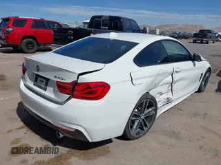 2019 BMW 4 Series 440i z VIN WBA4W7C56KAG52201, wystawiony jako IAAI lot #41639179 z przebiegiem 39 225 mil mil oraz . Historia ofert i sprzedaży dostępna na DreamBid. Obrazek 4.