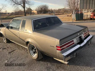 1987 Buick Regal with VIN 1G4GJ11Y4HP413978, listed as a Copart auction lot 87311954 with 52,519 mi miles and Salvage Title. Bid and sale history available at DreamBid. Image 3.