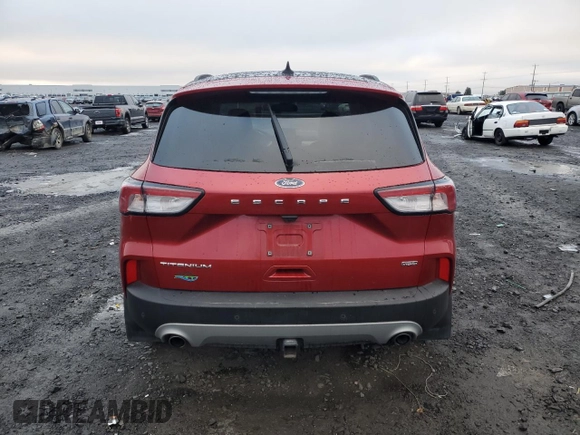 2022 Ford Escape Titanium Plug-In Hybrid z VIN 1FMCU0LZ2NUA23870, wystawiony jako Copart lot #84024854 z przebiegiem 27 759 mil mil oraz Szkoda całkowita • Salvage title. Historia ofert i sprzedaży dostępna na DreamBid. Obrazek 6.
