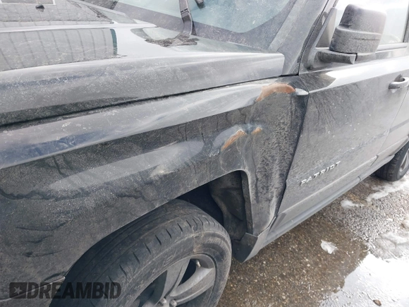 2015 Jeep Patriot High Altitude with VIN 1C4NJRFB0FD272338, listed as a IAAI auction lot 41448363 with 131,170 mi miles and . Bid and sale history available at carsss.com. Image 6.