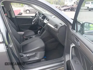 2024 Volkswagen Tiguan SE with VIN 3VV3B7AX8RM134486, listed as a IAAI auction lot 42095457 with 21,295 mi miles and . Bid and sale history available at DreamBid. Image 5.