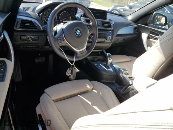 2016 BMW 2 Series 228i with VIN WBA1K9C50GV710942, listed as a Copart auction lot 77700934 with 28,643 mi miles and Salvage Title. Bid and sale history available at carsss.com. Image 8.