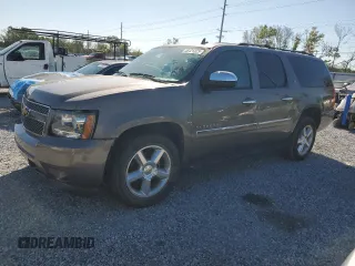 2014 Chevrolet Suburban LTZ with VIN 1GNSKKE71ER208550, listed as a Copart auction lot 48121325 with 110,611 mi miles and Salvage title. Bid and sale history available at DreamBid. Image 1.