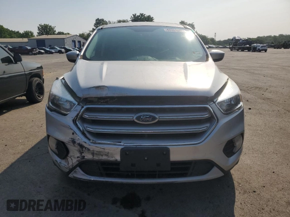 2017 Ford Escape SE z VIN 1FMCU9G99HUF01057, wystawiony jako Copart lot #60351695 z przebiegiem Nie podano mil oraz Czysty tytuł • Clean title. Historia ofert i sprzedaży dostępna na DreamBid. Obrazek 5.