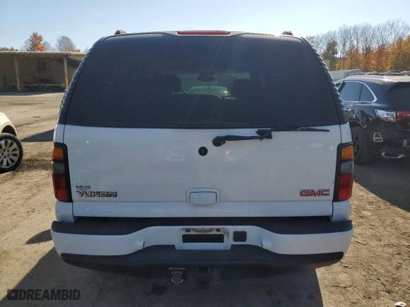 2005 GMC Yukon Denali with VIN 1GKEK63U75J163204, listed as a Copart auction lot 77300834 with 92,096 mi miles and Salvage Title. Bid and sale history available at carsss.com. Image 6.