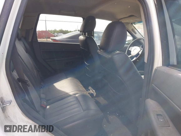 2008 Jeep Grand Cherokee Laredo with VIN 1J8GS48K28C229501, listed as a IAAI auction lot 42162413 with 1 mi miles. Bid and sale history available at carsss.com. Image 8.