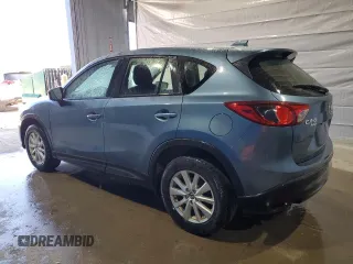 2015 Mazda CX-5 Sport with VIN JM3KE4BY9F0552942, listed as a Copart auction lot 54750245 with 129,700 mi miles and Salvage title. Bid and sale history available at DreamBid. Image 2.