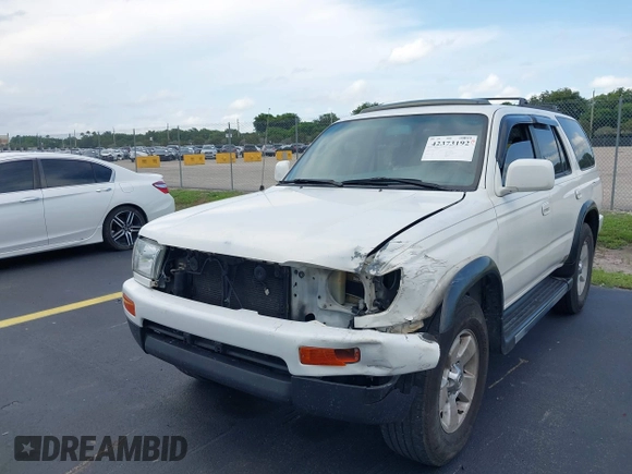 1998 Toyota 4Runner SR5 z VIN JT3GN86R5W0060650, wystawiony jako IAAI lot #42373192 z przebiegiem 264 886 mil mil oraz . Historia ofert i sprzedaży dostępna na DreamBid. Obrazek 6.