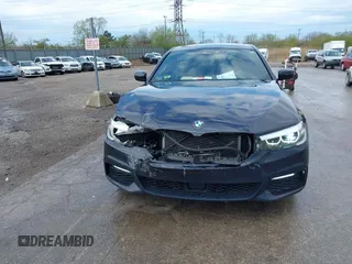 2018 BMW 5 Series 540i xDrive with VIN WBAJE7C58JWD49881, listed as a IAAI auction lot 42091065 with 73,542 mi miles and . Bid and sale history available at DreamBid. Image 12.